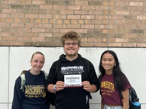 Roseville Area High School seniors Natalie Horsman (left), Owen King (middle), and Sophia Dang (right) reflect on what scholarship night meant to them. Dang stated, “scholarship night is important to me because it shows good deeds come back around.” 